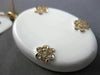 ESTATE LARGE .45CT DIAMOND & AAA WHITE ENAMEL 14KT ROSE GOLD FLOWER LOVE PENDANT