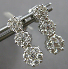 1.0CT DIAMOND 14KT WHITE GOLD 3D MULTI FLOWER JOURNEY SCREWBACK HANGING EARRINGS