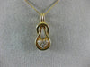 ESTATE .25CT DIAMOND 14KT YELLOW GOLD HEART LOVE KNOT INFINITY FLOATING PENDANT