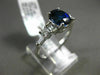 2.27CT ROUND & EMERALD DIAMOND & SAPPHIRE 18KT WHITE GOLD OVAL ENGAGEMENT RING