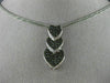 ESTATE .78CT WHITE & BLACK DIAMOND 14KT WHITE GOLD TRIPLE HEART JOURNEY PENDANT