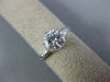 ESTATE 1.17CT DIAMOND PLATINUM 3D ROUND AND BAGUETTE 3 STONE ENGAGEMENT RING