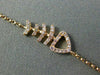 ESTATE .10CT PINK DIAMOND 18KT ROSE GOLD HAPPY SKELETON LUCKY FISH FUN BRACELET