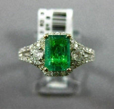 1.44CT DIAMOND & COLOMBIAN EMERALD 14KT 2 TONE GOLD 3 STONE HALO ENGAGEMENT RING