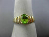 ESTATE 1.08CT ROUND DIAMOND & AAA OVAL PERIDOT 14KT YELLOW GOLD ENGAGEMENT RING