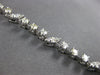 3.15CT DIAMOND 14KT WHITE GOLD 3D ROUND MULTI LEAF BY THE YARD TENNIS BRACELET