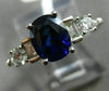 2.27CT ROUND & EMERALD DIAMOND & SAPPHIRE 18KT WHITE GOLD OVAL ENGAGEMENT RING