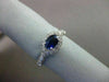ESTATE 1.03CT DIAMOND & AAA SAPPHIRE 18KT WHITE GOLD HALO DESIGN ENGAGEMENT RING