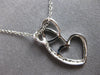 ESTATE .03CT DIAMOND 14KT WHITE GOLD 3D DOUBLE HEART LOVE FLOATING PENDANT