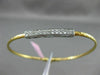 ESTATE .15CT DIAMOND 14KT TWO TONE GOLD ELONGATED PAVE FLEXIBLE BANGLE BRACELET