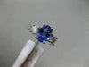 1.63CT ROUND DIAMOND & AAA OVAL TANZANITE 14K WHITE GOLD 3 STONE ENGAGEMENT RING