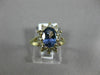 1.83CT DIAMOND & AAA OVAL TANZANITE 14KT YELLOW GOLD FLOWER HALO ENGAGEMENT RING