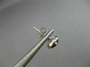 ESTATE 1.17CT DIAMOND & AAA GARNET 14KT WHITE GOLD ROUND HALO STUD EARRINGS