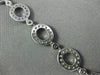 ESTATE 2.12CT DIAMOND 18KT WHITE GOLD CIRCULAR OVAL BY THE YARD TENNIS BRACELET