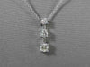 ESTATE LARGE .66CT ROUND DIAMOND 14KT WHITE GOLD 3 STONE FLOATING PENDANT #16660
