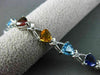 ESTATE 7.51CTW DIAMOND & AAA MULTI GEM 14KT WHITE GOLD TRILLION TENNIS BRACELET