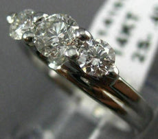 ESTATE .91CT DIAMOND 14KT WHITE GOLD 3D PAST PRESENT FUTURE TENSION RING #14161