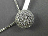 ESTATE .54CT DIAMOND 18KT WHITE GOLD 3D CLUSTER ROUND HALO FLOATING PENDANT 9mm