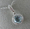 ESTATE .82CT DIAMOND & AAA AQUAMARINE 14K WHITE GOLD ROUND HALO FLOATING PENDANT