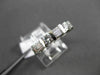 ESTATE .64CTW BAGUETTE & ROUND DIAMOND 14KT WHITE GOLD ANNIVERSARY RING F/G VSSI