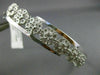 ESTATE .20CT DIAMOND 14K WHITE GOLD CLASSIC MULTI CLUSTER FLOWER BANGLE BRACELET