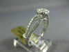 ESTATE .66CT DIAMOND 14KT WHITE GOLD 3D CLASSIC INVISIBLE ROUND ENGAGEMENT RING