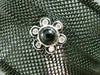 ESTATE .10CT DIAMOND ONYX 18KT WHITE GOLD FLOWER STAINLESS STEEL BANGLE BRACELET