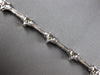 1.25CT DIAMOND 14KT WHITE GOLD 3D ROUND MULTI STAR BY THE YARD TENNIS BRACELET