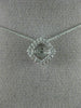 ESTATE .10CT DIAMOND 14KT WHITE GOLD 3D CLUSTER SQUARE DANCING DIAMOND PENDANT