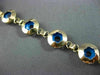 ESTATE 14KT YELLOW GOLD & ROUND BLUE CRYSTAL FLORAL EVIL EYE BRACELET #22954