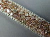 WIDE 22.84CT WHITE & PINK DIAMOND 18KT WHITE & ROSE GOLD CLUSTER TENNIS BRACELET