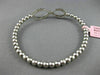 ESTATE .70CT DIAMOND 14KT WHITE GOLD 3D INFINITY FLEXIBLE LOVE BANGLE BRACELET
