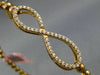ESTATE .70CT DIAMOND 14KT ROSE GOLD 3D INFINITY FLEXIBLE LOVE BANGLE BRACELET