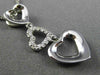 ESTATE .06CT DIAMOND 14KT WHITE GOLD 3D OPEN TRIPLE HEART FLOATING LOVE PENDANT