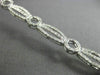 ESTATE WIDE .96CT DIAMOND 14KT WHITE GOLD CLASSIC CIRCLE OF LIFE TENNIS BRACELET