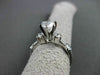 ESTATE 1.12CT ROUND & BAGUETTE DIAMOND 14KT WHITE GOLD SOLITAIRE ENGAGEMENT RING