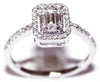 ESTATE .50CT DIAMOND 18KT WHITE GOLD ROUND & BAGUETTE INVISIBLE FRIENDSHIP RING