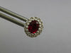 1CT DIAMOND & AAA RUBY 18KT WHITE GOLD OVAL & ROUND FLOWER CLASSIC STUD EARRINGS