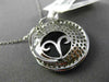 ESTATE LARGE 1.34CT DIAMOND & ONYX 18KT WHITE GOLD SWIRL SHELL FLOATING PENDANT