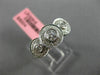 ESTATE .92CT DIAMOND 18KT WHITE GOLD 3 STONE PAST PRESENT FUTURE HALO BEZEL RING