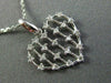 ESTATE .18CT DIAMOND 14KT WHITE GOLD 3D OPEN HEART CLUSTER FLOATING LOVE PENDANT