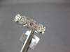 ESTATE .97CT DIAMOND 18K WHITE GOLD HALO SEMI ETERNITY INFINITY ANNIVERSARY RING