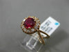 ESTATE WIDE 1.40CTW DIAMOND & AAA RUBY 14KT ROSE GOLD HALO CLASSIC INFINITY RING