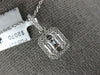 ESTATE .49CT DIAMOND 18K WHITE GOLD ROUND & BAGUETTE CLUSTER SQUARE HALO PENDANT