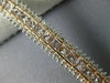 ESTATE WIDE 11.12CT WHITE & PINK DIAMOND 18KT WHITE & ROSE GOLD TENNIS BRACELET