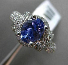 ESTATE WIDE 2.51CT DIAMOND & TANZANITE 18KT WHITE GOLD INFINITY ENGAGEMENT RING