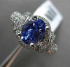 ESTATE WIDE 2.51CT DIAMOND & TANZANITE 18KT WHITE GOLD INFINITY ENGAGEMENT RING