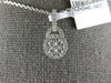 ESTATE .34CT DIAMOND 18KT WHITE GOLD 3D CLUSTER HALO CLASSIC LOVE KNOT PENDANT
