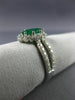 ESTATE 1.53CT DIAMOND & AAA EMERALD 18KT WHITE GOLD CLASSIC HALO ENGAGEMENT RING