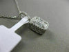 ESTATE .50CT BAGUETTE DIAMOND 18KT WHITE GOLD RECTANGULAR HALO FLOATING PENDANT